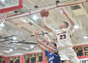 Strong fourth quarter hands University High boys' hoops the sectional crown